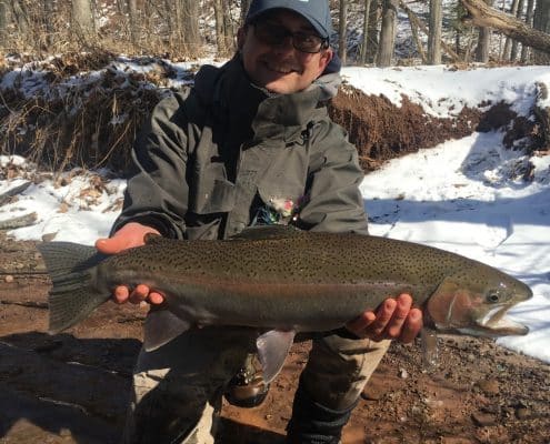 Oak Orchard Tackle and Lodge - man with fish